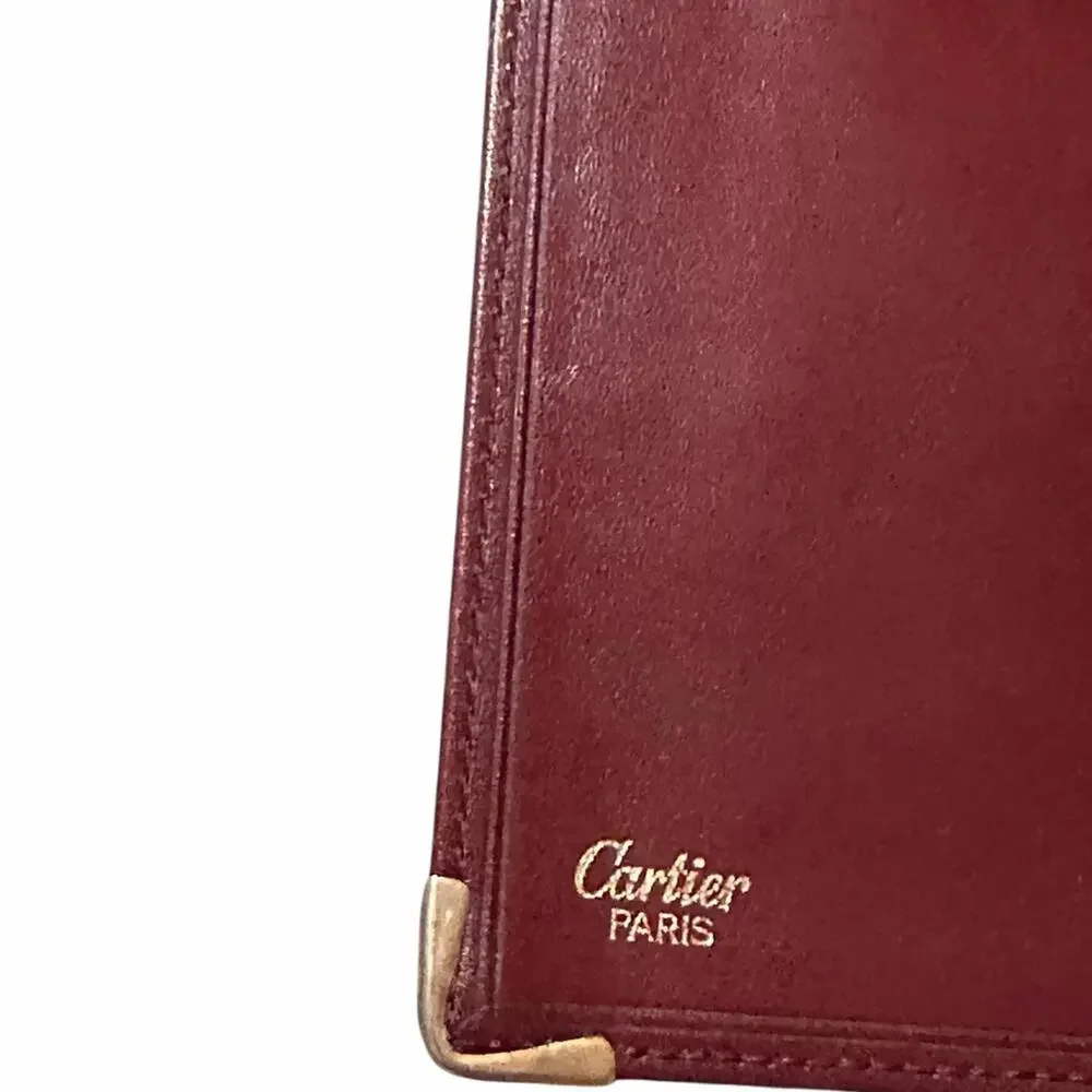Vintage Cartier Burgundy Leather Men's Wallet with Gold Corner Accents